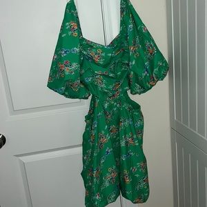 Green cut out dress with pockets.